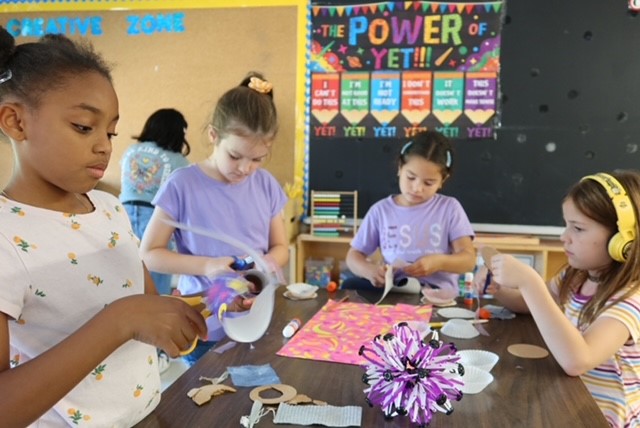 Girls participate in STEM activities in a PLASP classroom